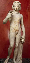 Dionysus with kylix and
grape head dress